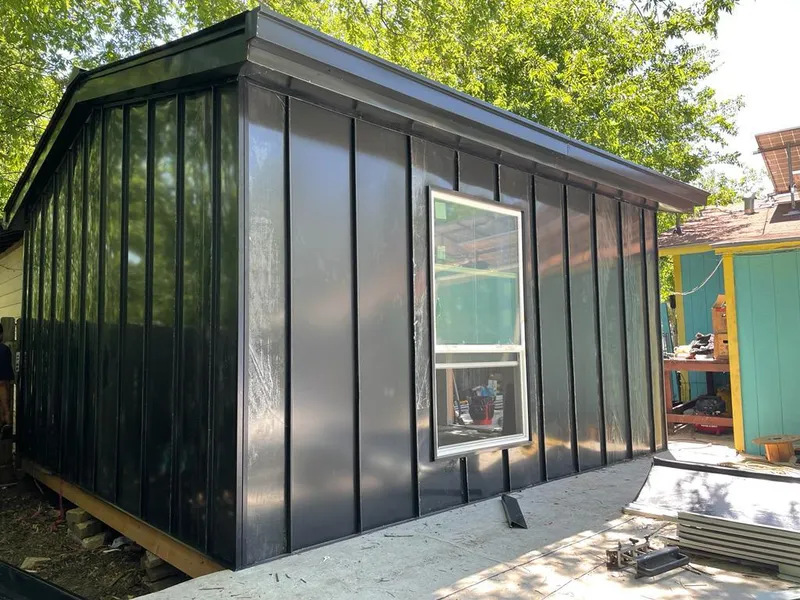 Black standing seam metal wall panels for Roof Inspection in Monticello