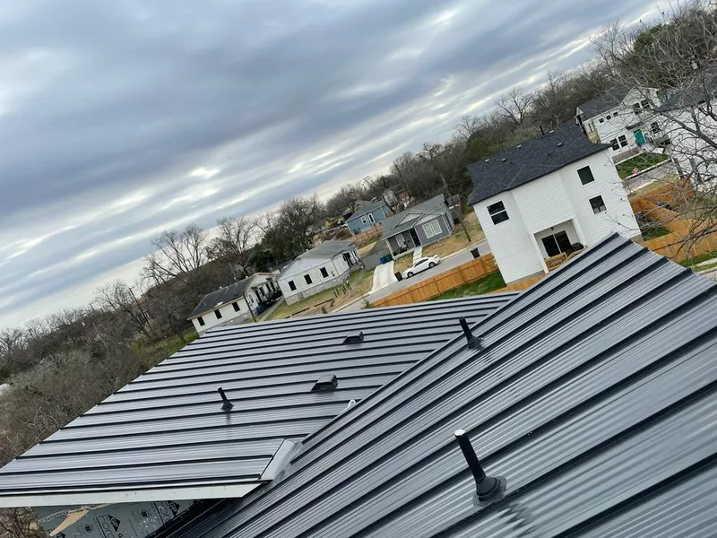 Standing seam metal roof panels with vents for Skylight Repair in Monticello